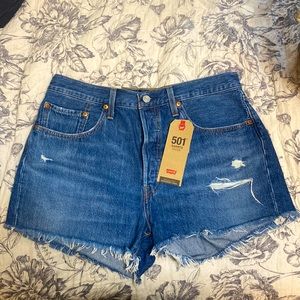 NEW Levi’s 501 hi-rise blue distressed jean shorts.